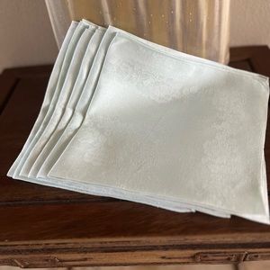 Six cotton pale blue napkins, delicate brocade